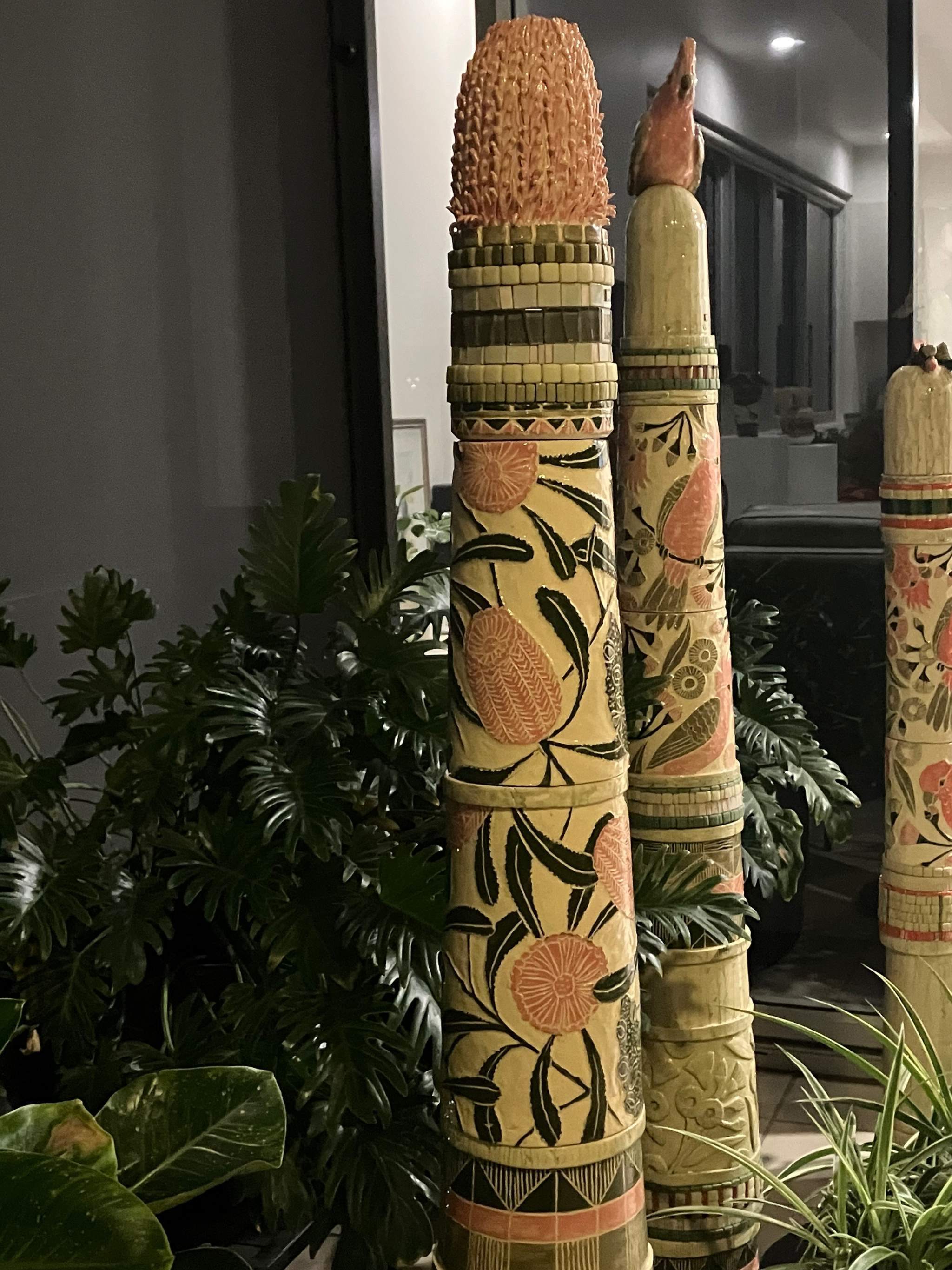 Tall ceramic sculptures with pink Banksia flowers and mosaic inlay, Australian native birds and other flora